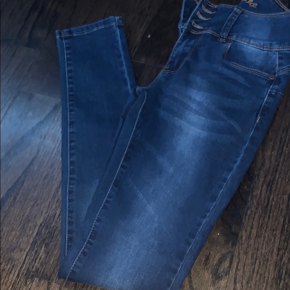 High waisted blue jeans